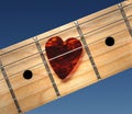 Guitar with heart Royalty Free Stock Photo
