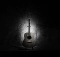 guitar instrument musical retro style. Material Face Wood Solid Spruce, Mahogany Body. Art photography. Isolated on wall cement