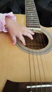 Guitar learning background baby fingers Royalty Free Stock Photo