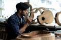 Guitar Luthier Ensures Back and Body Match in Mold