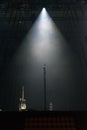 Guitar and microphone stand on the stage under the spotlight Royalty Free Stock Photo