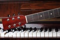 Guitar neck on piano keys