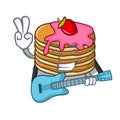 With guitar pancake with strawberry mascot cartoon