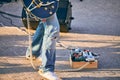 Guitar pedalboard pedal box for electric guitar on floor at outdoor rock party, guitar effects unit Royalty Free Stock Photo