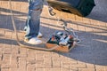 Guitar pedalboard pedal box for electric guitar on floor at outdoor rock party, guitar effects unit Royalty Free Stock Photo