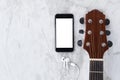 Guitar and phone mobile white screen showing white screen top vi Royalty Free Stock Photo