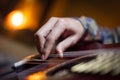 Guitar played by guitarist hand