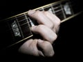 Guitar Player Fingering Chords On Fretboard Royalty Free Stock Photo