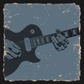 Guitar player on grunge background Royalty Free Stock Photo