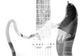 Guitar player and guitar silhouette in double exposure effect in Royalty Free Stock Photo