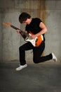 Guitar Player Jumping Royalty Free Stock Photo