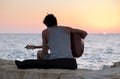 The guitar player on Tel-Aviv beach at sunset Royalty Free Stock Photo