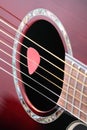 Guitar plectrum on strings Royalty Free Stock Photo