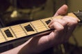 Guitar practice under the dim light Royalty Free Stock Photo