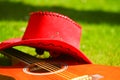 Guitar and red hat Royalty Free Stock Photo