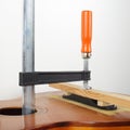 Guitar repair and service - Glue retro Acoustic Guitar Bridge