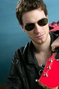 Guitar rock star man sunglasses leather jacket Royalty Free Stock Photo