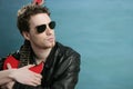 Guitar rock star man sunglasses leather jacket Royalty Free Stock Photo