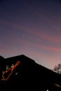 Guitar sign and sunset sky and moon Royalty Free Stock Photo