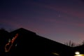 Guitar sign and sunset sky and moon Royalty Free Stock Photo