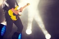 Guitar, stage and man at music festival, concert or live event in Amsterdam. Musician, artist and electric instrument