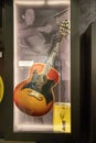 A guitar used and signed by Johnny Cash on display inside of the Johnny Cash Museum in Nashville Tennessee