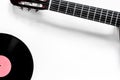 Guitar with vinyl record in music studio for dj or musician work white desk background top view mock-up Royalty Free Stock Photo