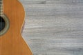 Guitar on the wooden background