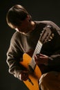 Guitarist classical acoustic guitar playing