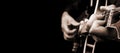 Guitarist hands and guitar close up. playing electric guitar black and white. copy space Royalty Free Stock Photo