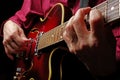 Guitarist hands and guitar close up. playing electric guitar. play the guitar.