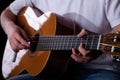 Guitarist hands playing classical guitar