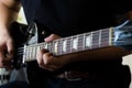 Guitarist play on electric guitar Royalty Free Stock Photo