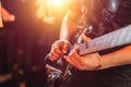 Guitarist play music song on stage