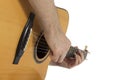 Guitarist playing acoustic guitar, closeup Royalty Free Stock Photo
