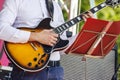 Guitarist playing at city park jazz festival Royalty Free Stock Photo