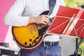 Guitarist playing at city park jazz festival Royalty Free Stock Photo