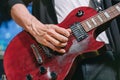 Guitarist Playing Electric Guitar live on stage. Close-up. Royalty Free Stock Photo