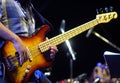 Guitarist playing electrical bass guitar on a jazz concert Royalty Free Stock Photo