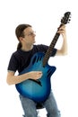 Guitarist playing his electroacoustic guitar, vertical Royalty Free Stock Photo