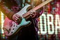 Guitarist playing a solo part at a rock concert Royalty Free Stock Photo