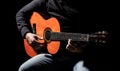 Guitarist plays. Play the guitar. Hipster man sitting in a pub. Live music. Guitars and strings. Man playing guitar Royalty Free Stock Photo