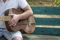 Guitarist and retro guitar. Playing guitar