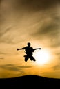 Guitarist silhouette jumping