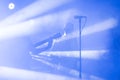 Guitarist silhouette perform on a concert stage. Abstract musical background. Music band with guitar player. Playing Royalty Free Stock Photo