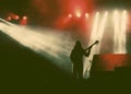 Guitarist silhouette in smoke during concert