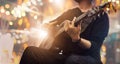 Guitarist on stage and sings at a concert for background, Royalty Free Stock Photo
