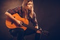 Guitarist trying out chords Royalty Free Stock Photo