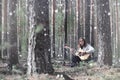 Guitarist in the woods at a picnic. A musician with an acoustic Royalty Free Stock Photo