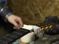 Guitars Luthiers installs Nut.